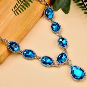 NWT—Simulated Blue Topaz with Austrian Crystal necklace. Length 20 to 22 inches